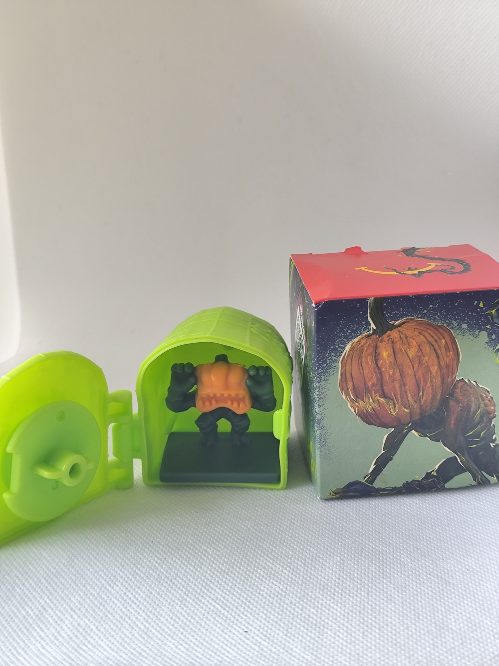 Green Haunted Capsule Toy with Pumpkin Monster Figure